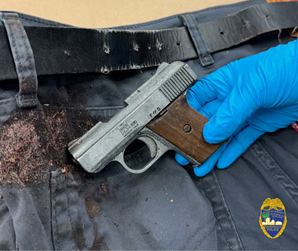 The silver firearm was found in Jones' pants after the incident.